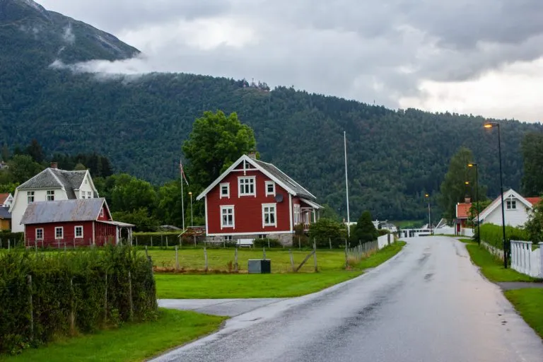 Empty street in the small town Balestrand. Nobody here. Around beautiful houses and perfectly flat asphalt